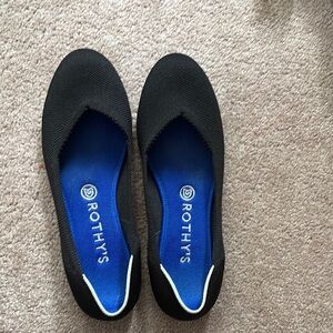 Rothy’s Original black flats with white halo, 8.5